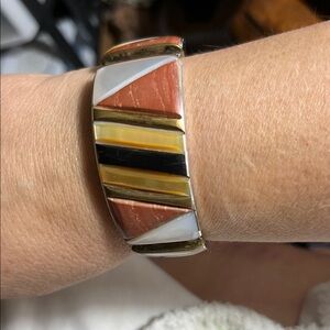 Elegant Geometric Bracelet with Gold and Black Accents